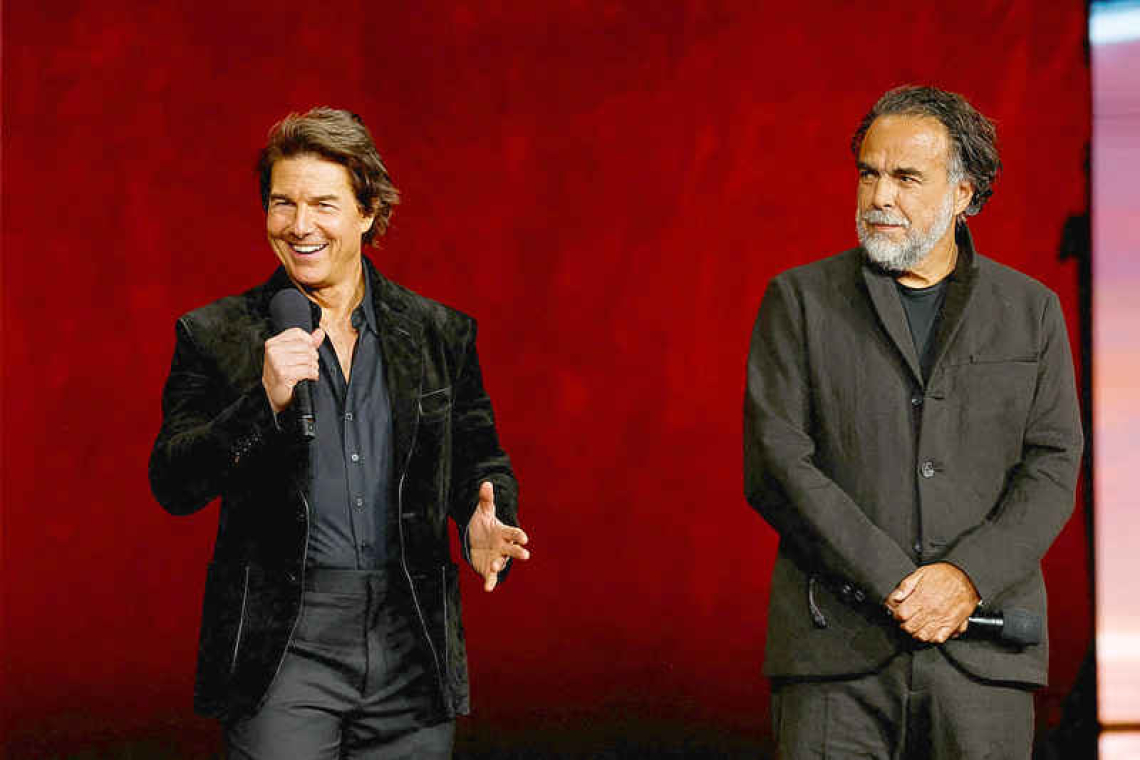 Cruise touts 'wild' dark  comedy to theater owners